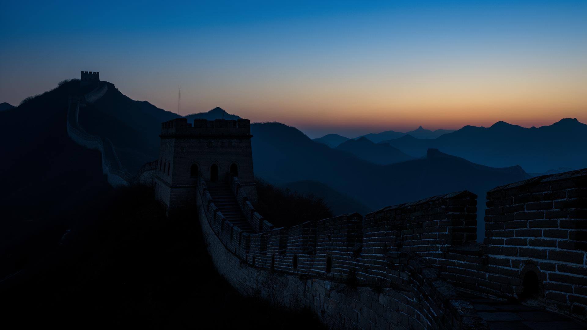 The Great Wall of China at dusk winding across mountain ridges